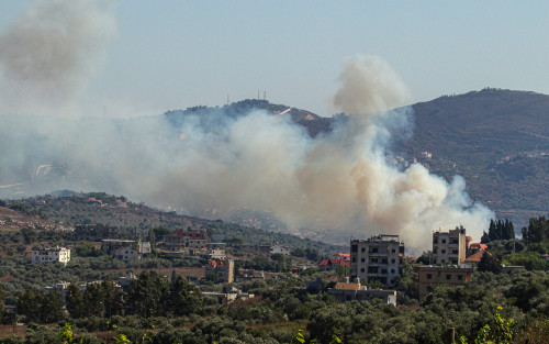 Smoke billows from a site targeted by the Israeli military in the southern Lebanese border village of Kafr Kila on July 29, 2024, amid ongoing cross-border clashes between Israeli troops and Hezbollah fighters. - Fallout from the Gaza war is regularly felt on the Israel-Lebanon frontier, where deadly cross-border exchanges have escalated between Israeli troops and mainly Hezbollah fighters. (Photo by Rabih DAHER / AFP)