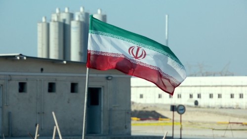 A picture taken on November 10, 2019, shows an Iranian flag in Iran's Bushehr nuclear power plant, during an official ceremony to kick-start works on a second reactor at the facility. - Bushehr is Iran's only nuclear power station and is currently running on imported fuel from Russia that is closely monitored by the UN's International Atomic Energy Agency. (Photo by ATTA KENARE / AFP) (Photo by ATTA KENARE/AFP via Getty Images)