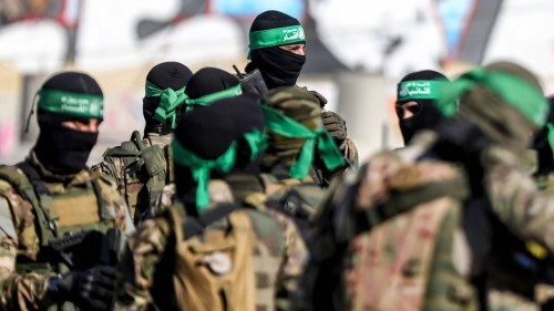 Gunmen from the Izz al-Din al-Qassam Brigades, the military wing of Hamas during an anti-Israel military parade in Gaza City. - Yousef Masoud / SOPA Images//SOPAIMAGES_sopa011325/2207210853/Credit:SOPA Images/SIPA/2207210909