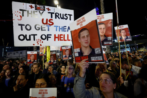 People rally calling for the release of hostages kidnapped on the deadly October 7 attack by Palestinian Islamist group Hamas, amid the ongoing conflict between Israel and the Palestinian Islamist group Hamas, in Tel Aviv, Israel, December 9, 2023. REUTERS/Clodagh Kilcoyne