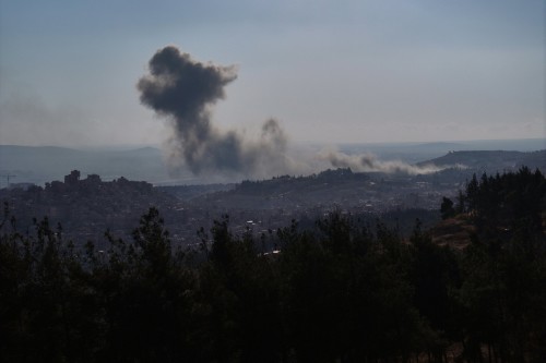 AFP__20241208__36PU7AN__v1__HighRes__SyriaIsraelConflictStrike[1]